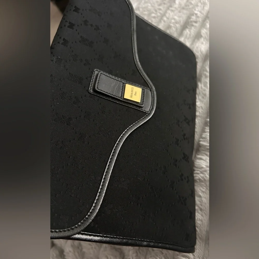 Nina Ricci Signature Clutch EUC (no call outs)